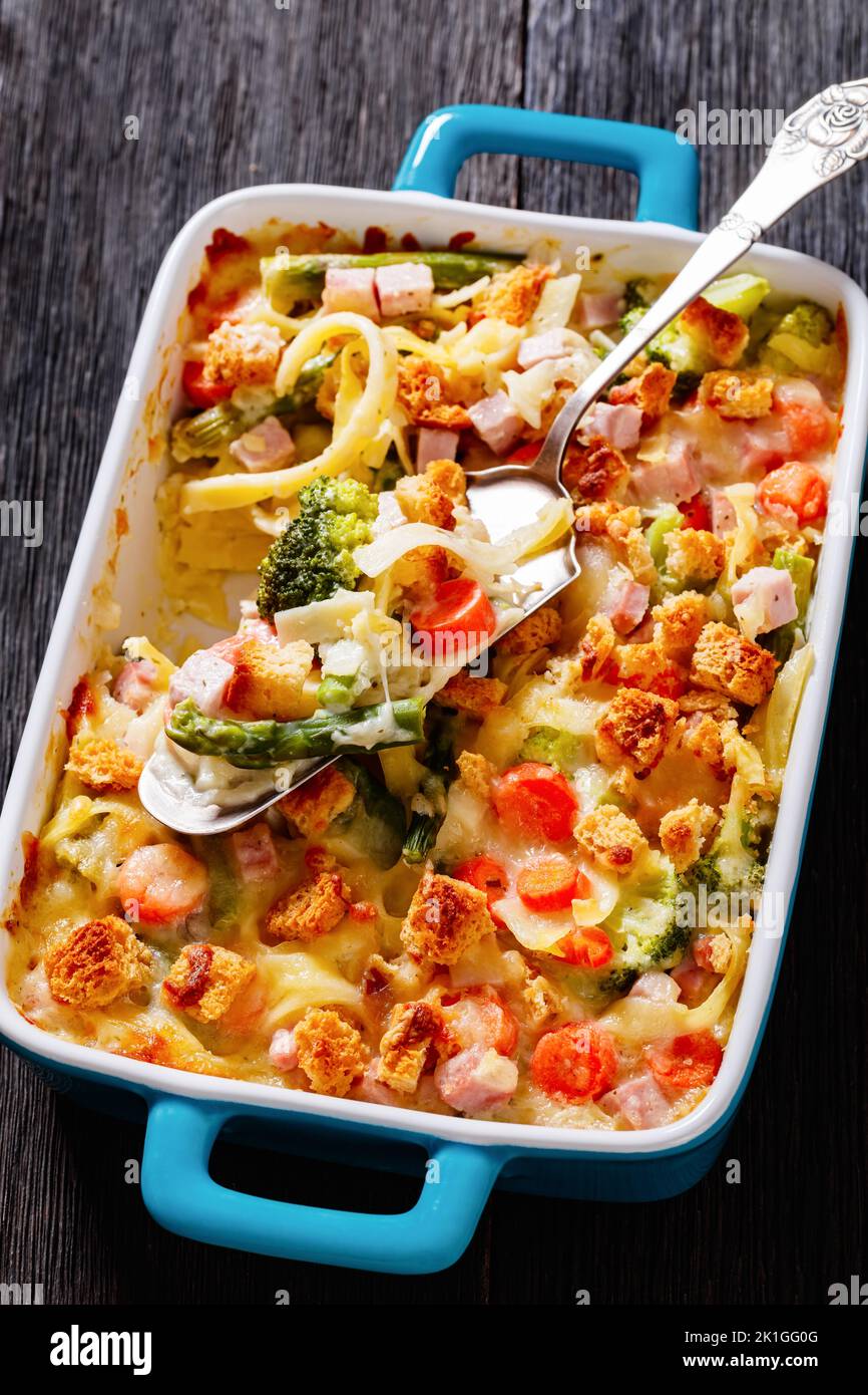 Ham and Noodle Casserole with egg noodles, chopped ham, carrots