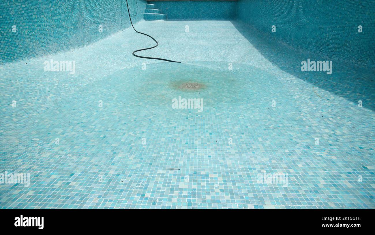 Mosaic pool filling after re-grouting Stock Photo