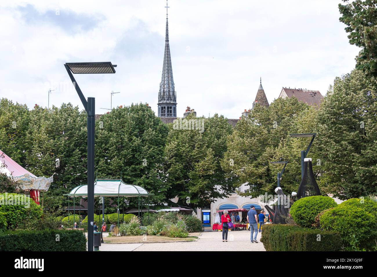 Place Carnot in Beaune, Burgundy with the spire of the Hospices de Beaune in the background. Stock Photo