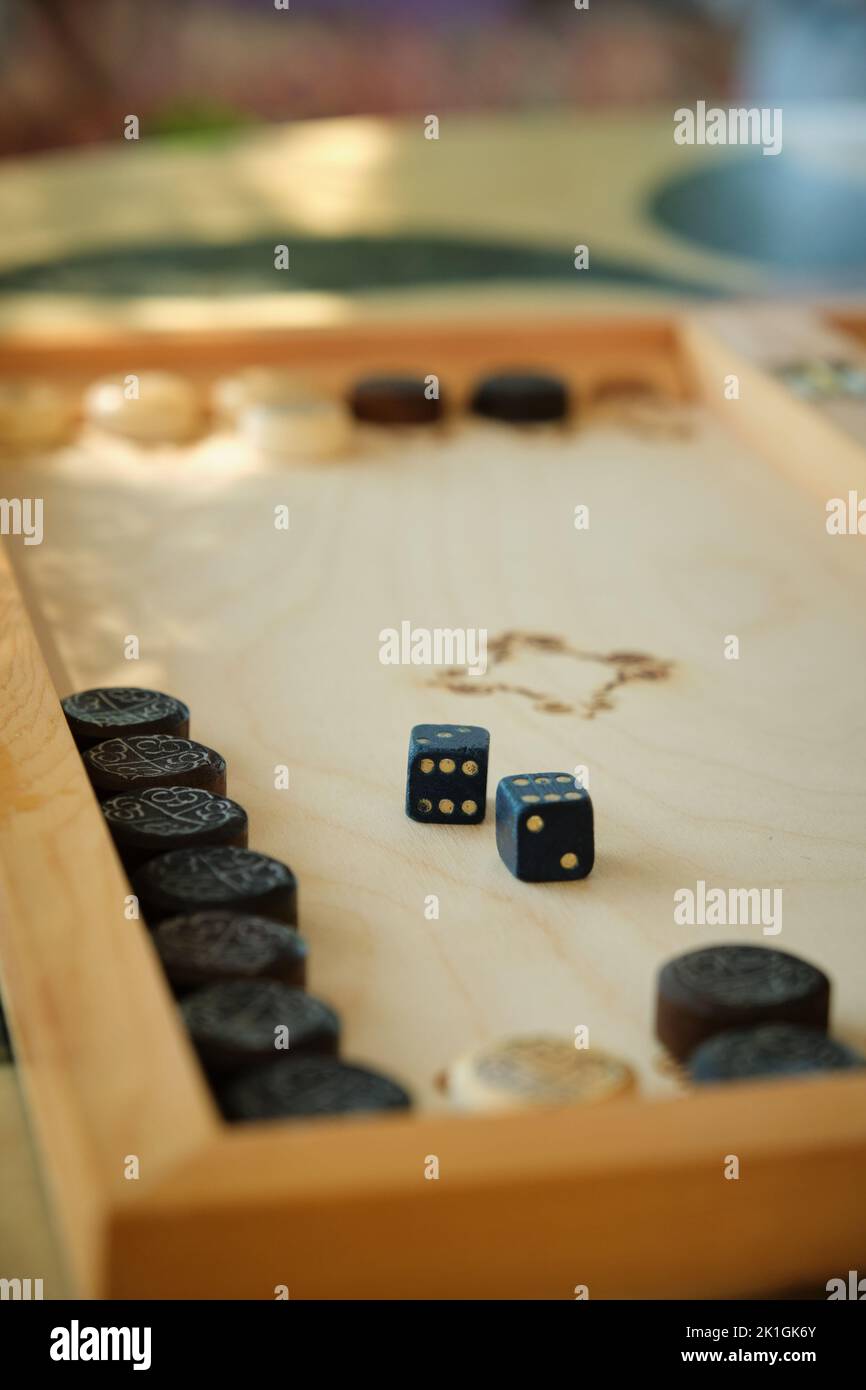 cubes on a backgammon board Stock Photo Alamy