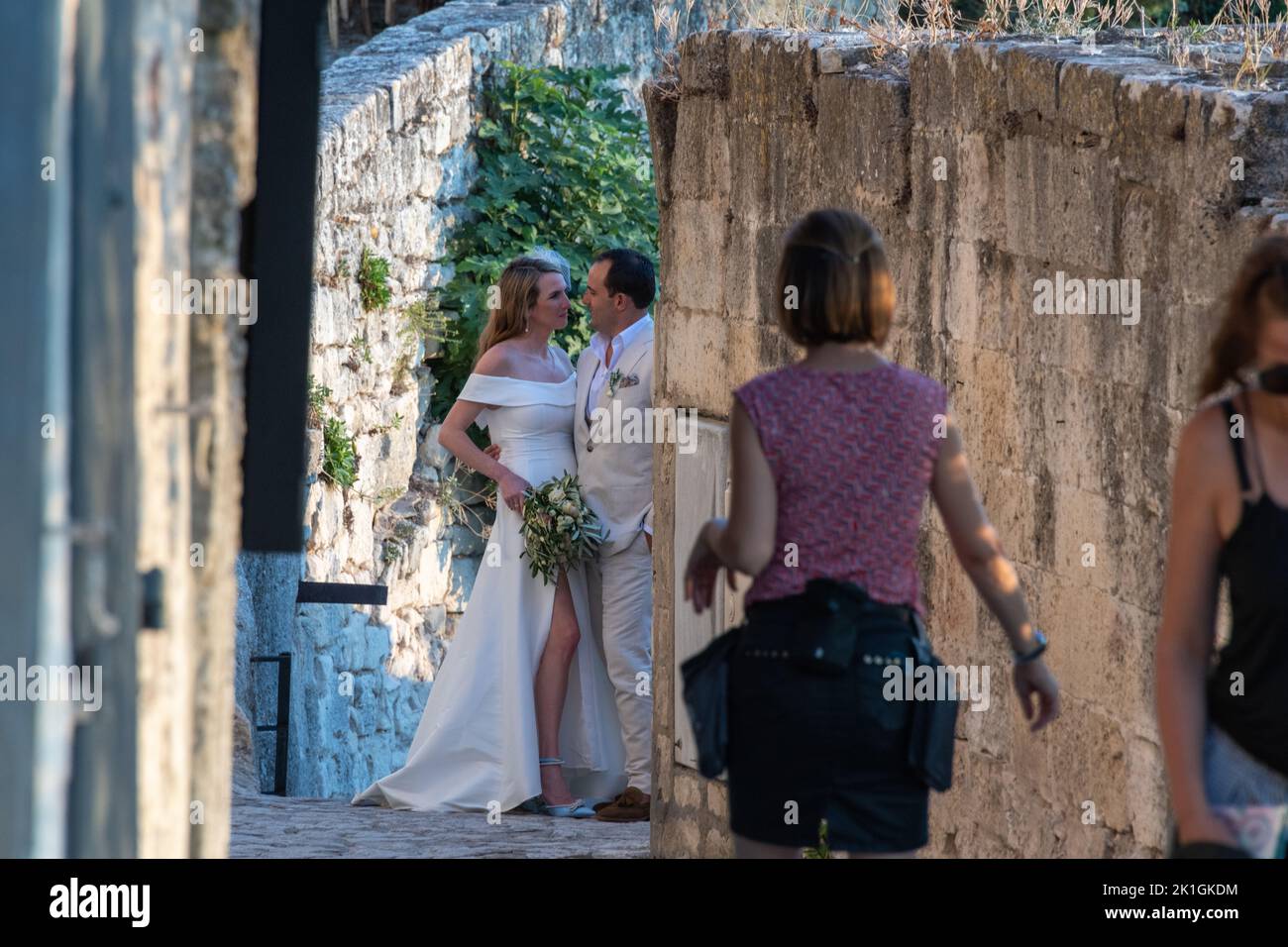A couple pose for photos at their wedding in Les Baux-de-Provence in the South of France. Stock Photo