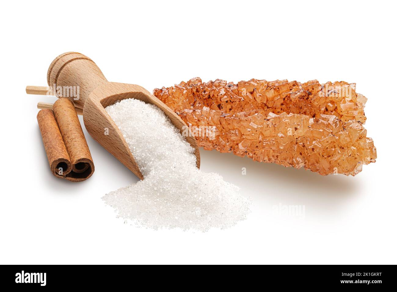 Sugar crystal sticks with cinnamon isolated on white Stock Photo