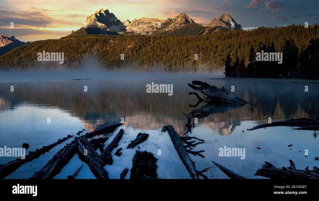 Mist looms over Redfish Lake in the Sawtooth mountains Stock Photo