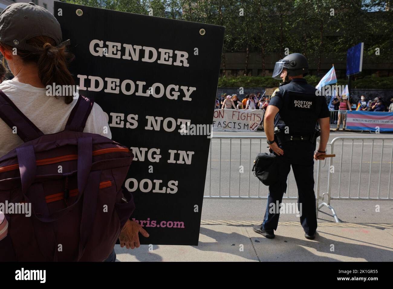 A supporter of 'Billboard Chris', who opposes medical treatments for transgender youth, stands across the street from counter-protestors outside Children's Hospital in Boston, Massachusetts, U.S., September 18, 2022.     REUTERS/Brian Snyder Stock Photo
