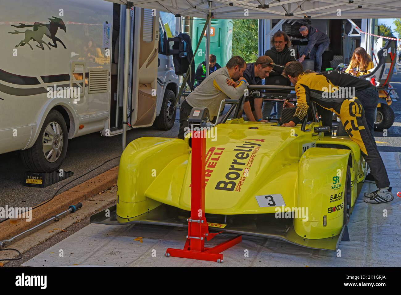 LIMONEST, FRANCE, September 17, 2022 : Teams install themselves on the side of the streets in the village for the annual uphill car race, counting for Stock Photo