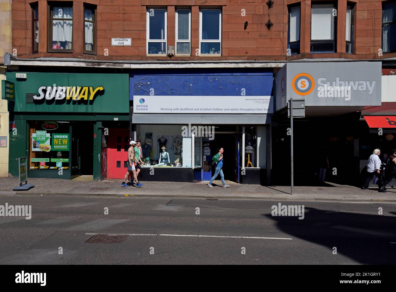 A Subway sandwich shop adjacent to the entrance to the Glasgow Subway station at Kelvinhall, Glasgow, Scotland,UK Stock Photo
