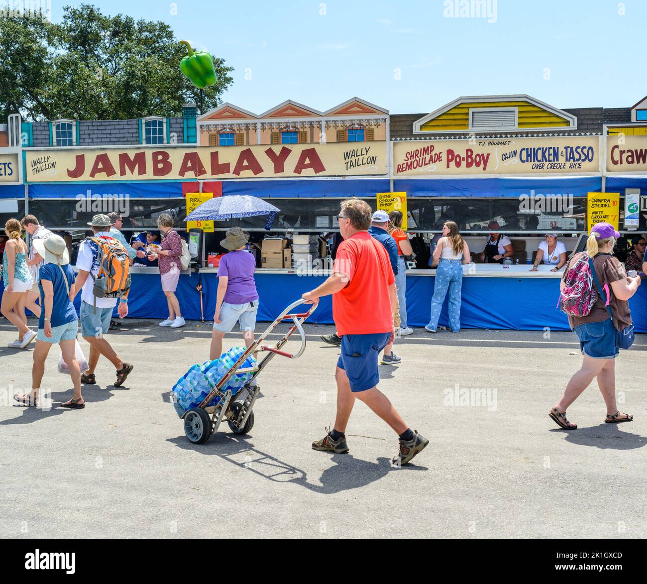 NEW ORLEANS, LA, USA - April 29, 2022: Food booths and crowd at the  New Orleans Jazz and Heritage Festival Stock Photo