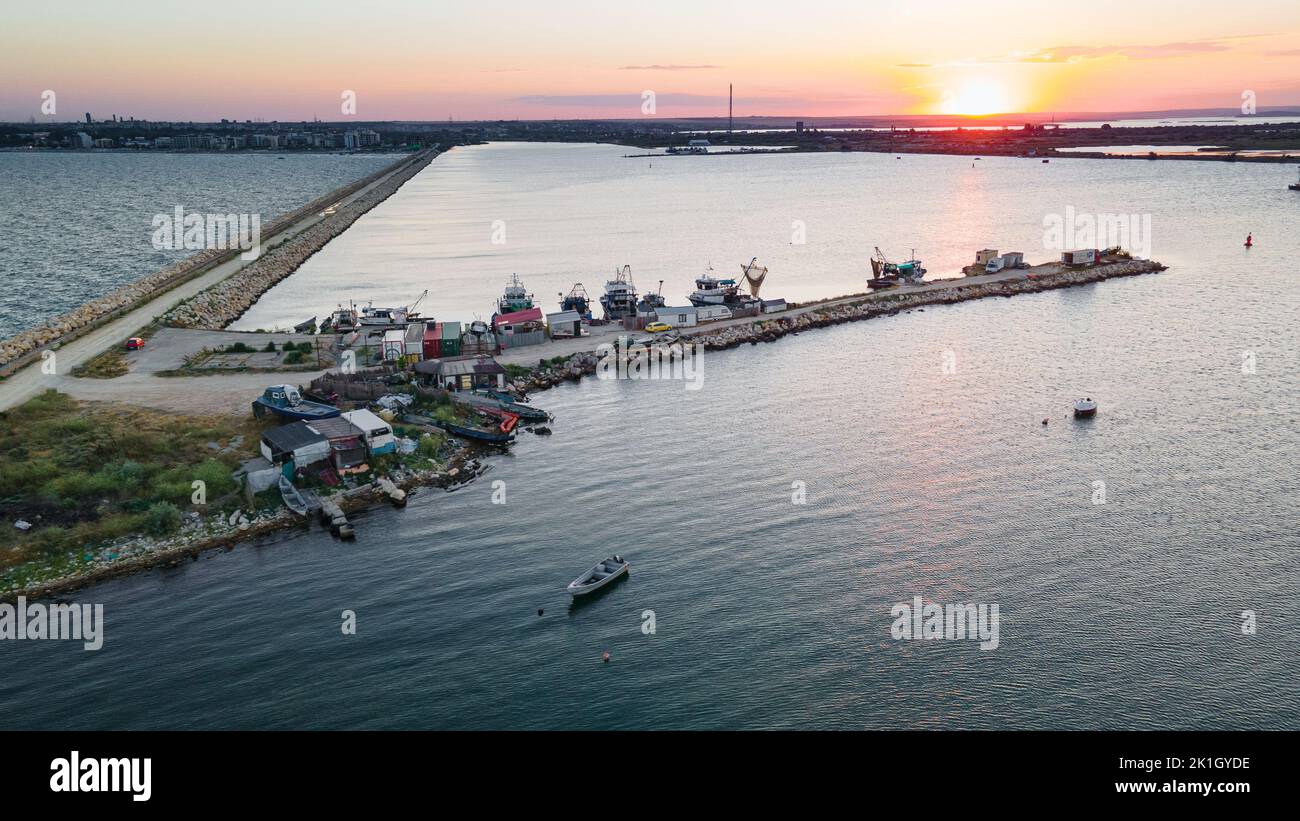 Aerial view of a harbor with boats sailing and docked. Photography was ...