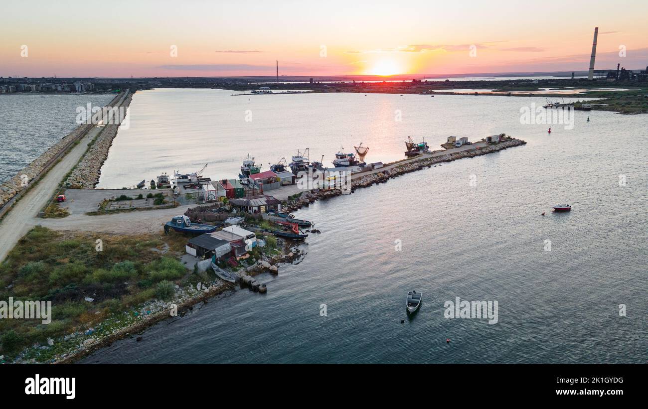 Aerial view of a harbor with boats sailing and docked. Photography was ...