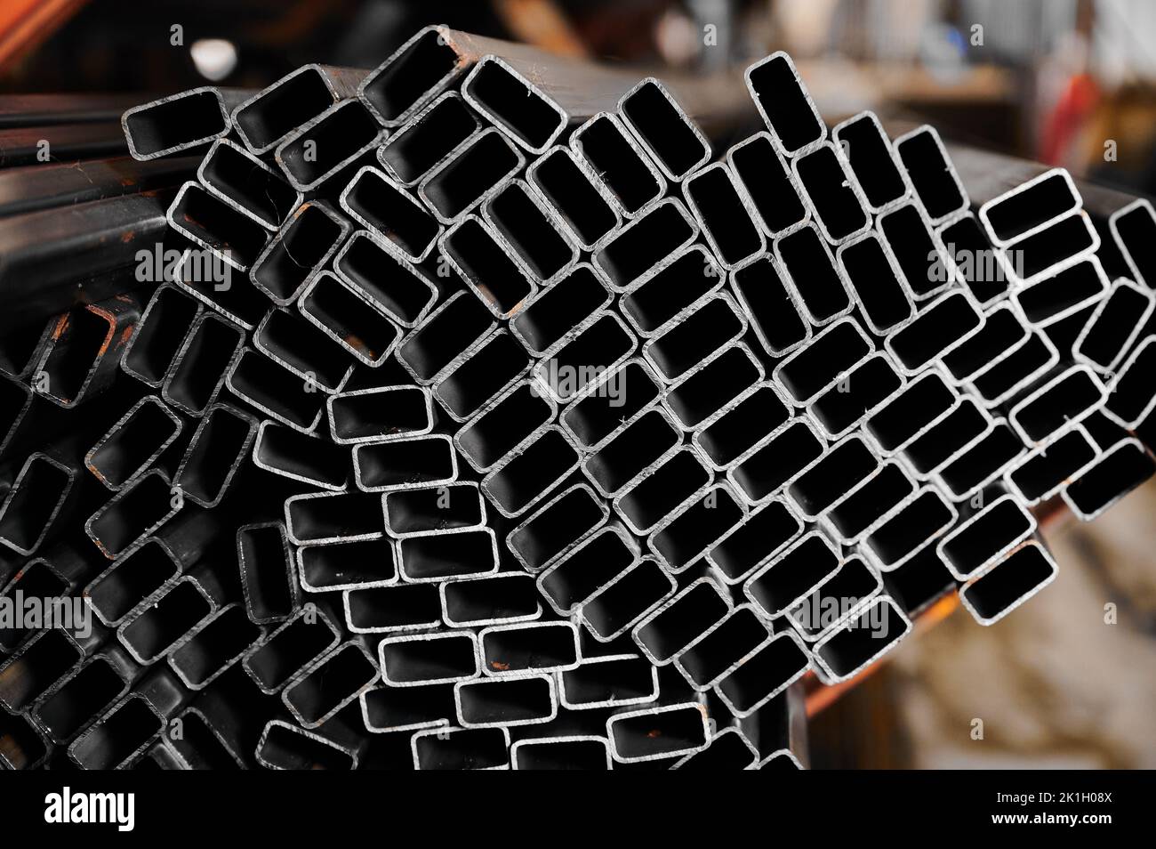 Rectangle heat tubing on rack in cold factory warehouse Stock Photo - Alamy