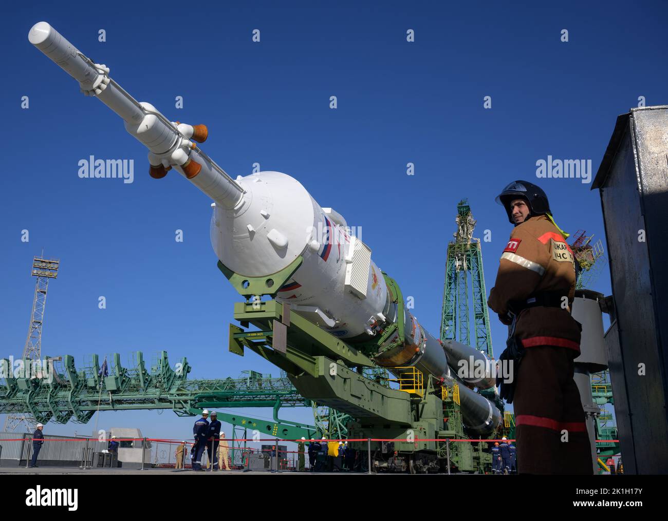 Baikonur, Kazakhstan. 18th Sep, 2022. Russian fire crews watch as the Soyuz MS-22 spacecraft and booster rocket are rolled out by train to launch pad 31 of the Baikonur Cosmodrome, September 18, 2022 in Baikonur, Kazakhstan. International Space Station Expedition 68 crew members astronaut Frank Rubio of NASA, and cosmonauts Sergey Prokopyev and Dmitri Petelin of Roscosmos are set to launch September 21st to the orbiting laboratory. Credit: Bill Ingalls/NASA/Alamy Live News Stock Photo