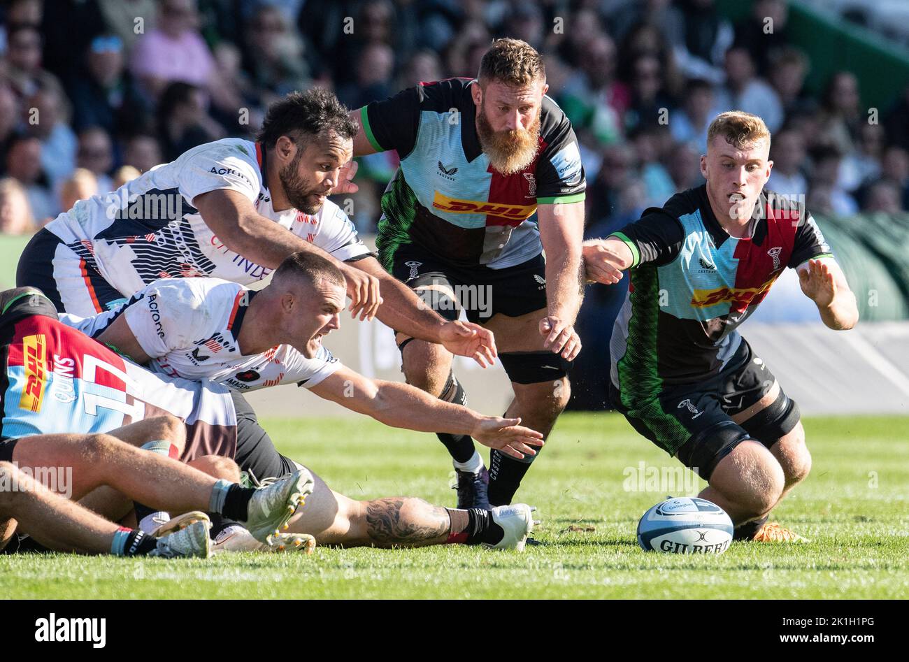 Billy Vunipola, Ben Earl and Irne Herbst scrambling for the ball during the Gallagher Premiership Rugby match between Harlequins and Saracens at Twick Stock Photo