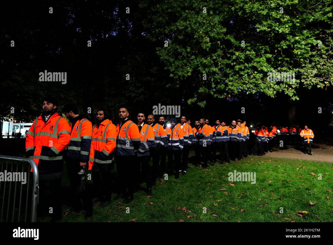Security guards prepare to change shifts in Green Park outside of