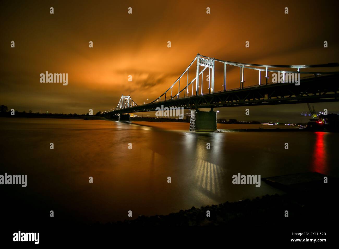 A beautiful shot of the Krefeld-Uerdinger bridge in Uerdingen, Germany, during a beautiful sunset Stock Photo