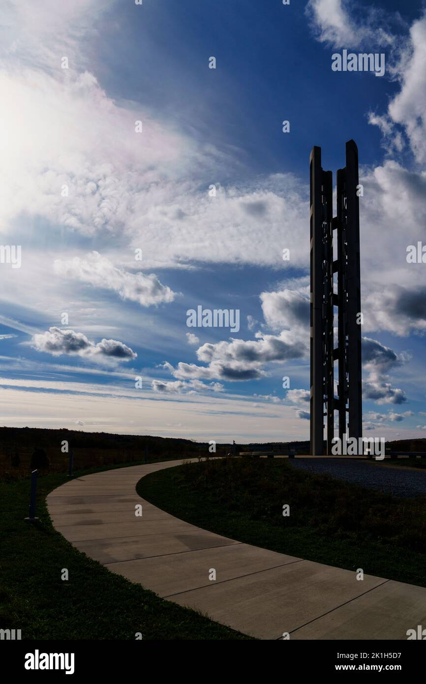 The Tower of Voices stands out against the dramatic morning sky at