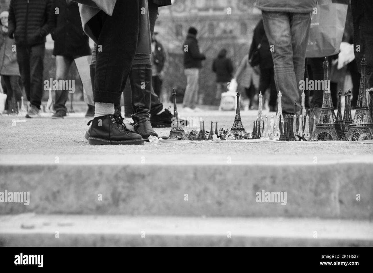 A Stand with small Eiffel Towers, souvenirs on the square in front of