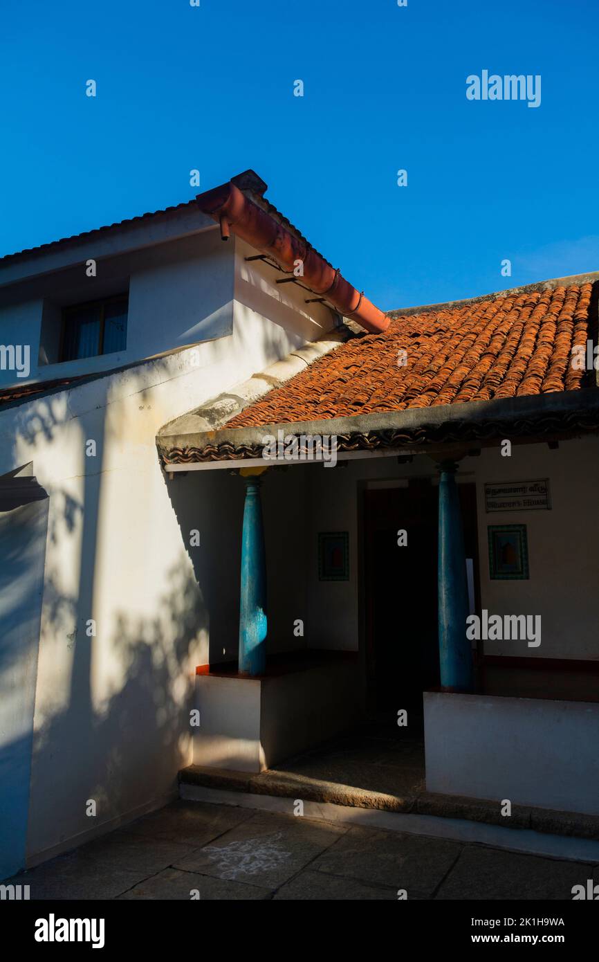 A vertical shot of old traditional south Indian house on sunny day Stock Photo