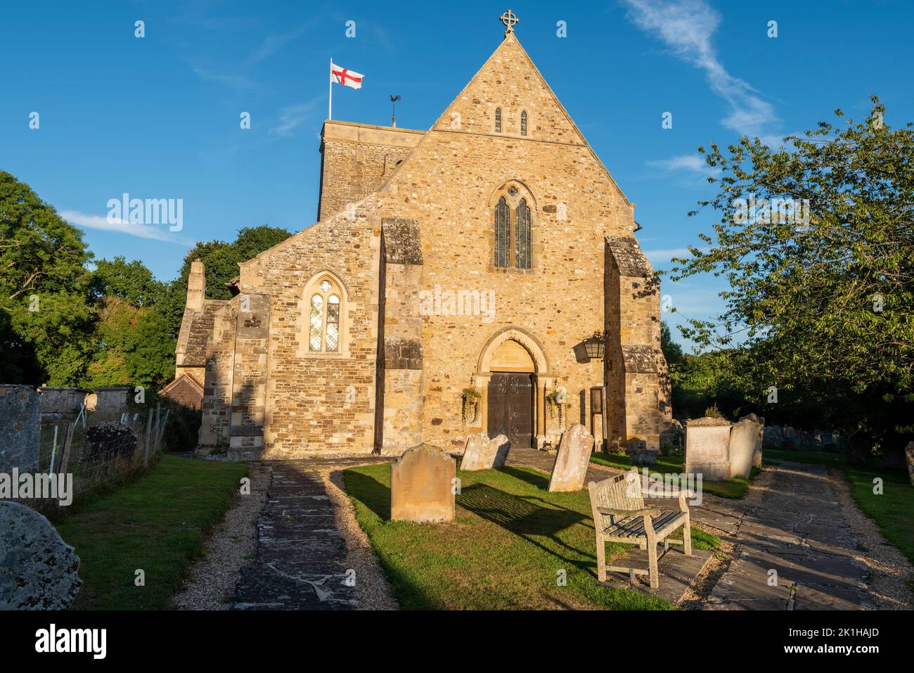 The Church of St Mary the Virgin in bright evening sunlight in the