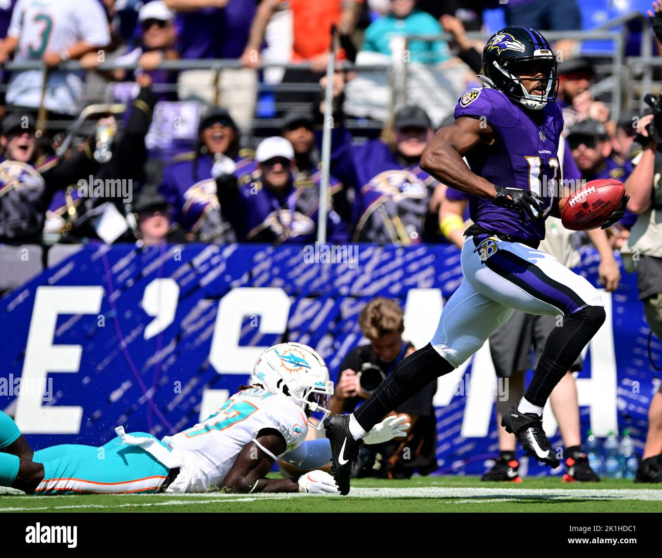Baltimore, USA. 18th Sep, 2022. Baltimore Ravens wide receiver Devin Duvernay (13) runs down the sideline on a 103-yard kickoff return for a touchdown past Miami Dolphins cornerback Keion Crossen (27) during the first half of an NFL game at M&T Bank Stadium in Baltimore, Maryland, on Sunday, September 18, 2022. Photo by David Tulis/UPI Credit: UPI/Alamy Live News Stock Photo