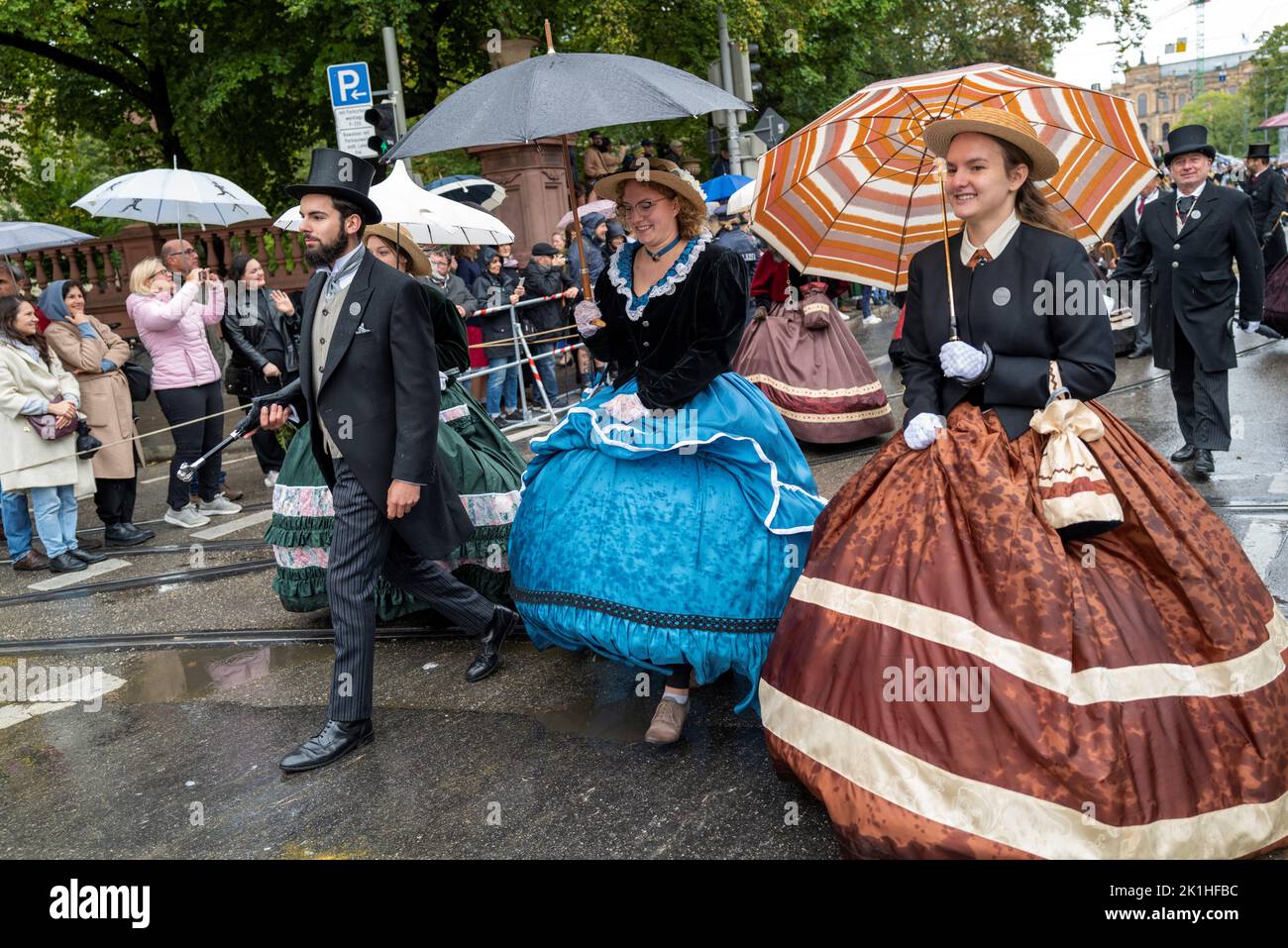 Munich, Germany.  18 Sep, 2022. The Oktoberfest Costume and Riflemen's Parade took place today with early showers failing to dampen the spirits of all involved. Saturday's official opening saw crowds down on the last time the Oktoberfest was held but there were considerably more people out and about today despite the rain. Credit: Clearpiximages/Alamy Live News Stock Photo