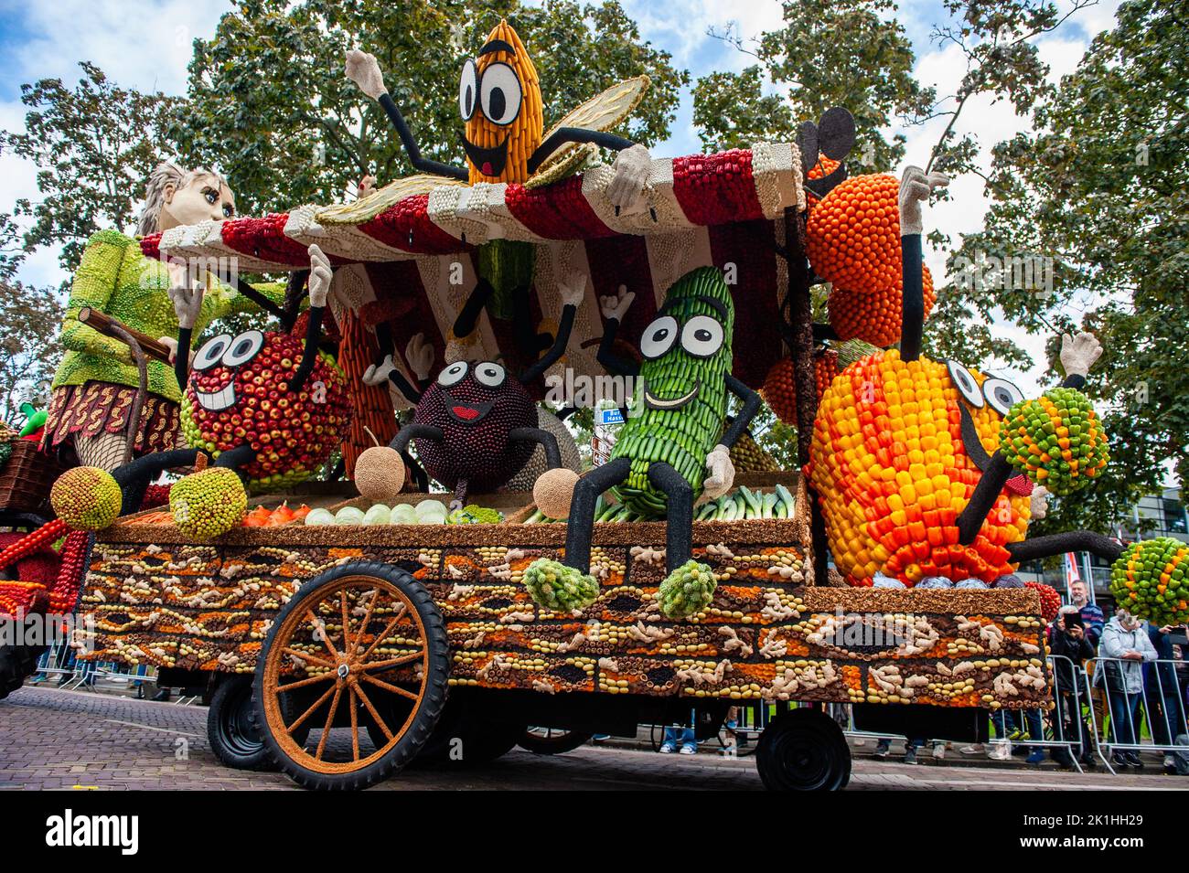 Big fruits and vegetables are seen decorating one of the floats. The