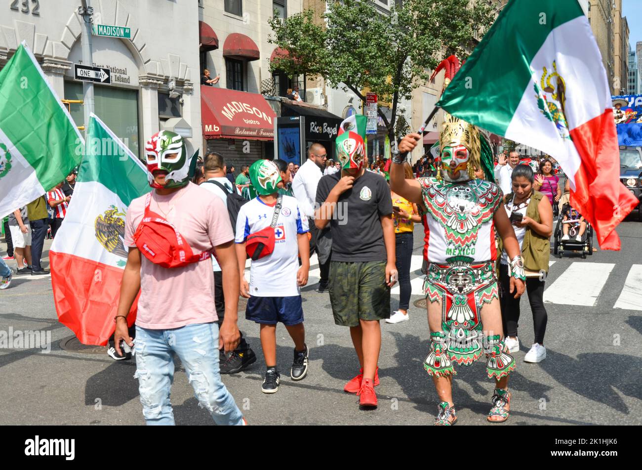 New York, USA. 18th Sep, 2022. Parade participants march through