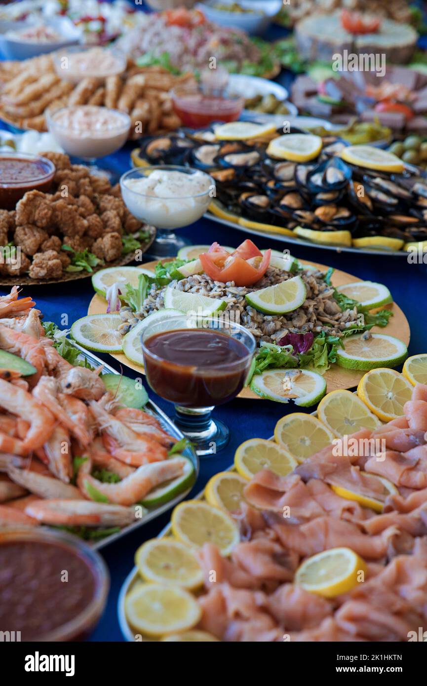 Selection of cold starters such as seafood, meat, salads and sauces at