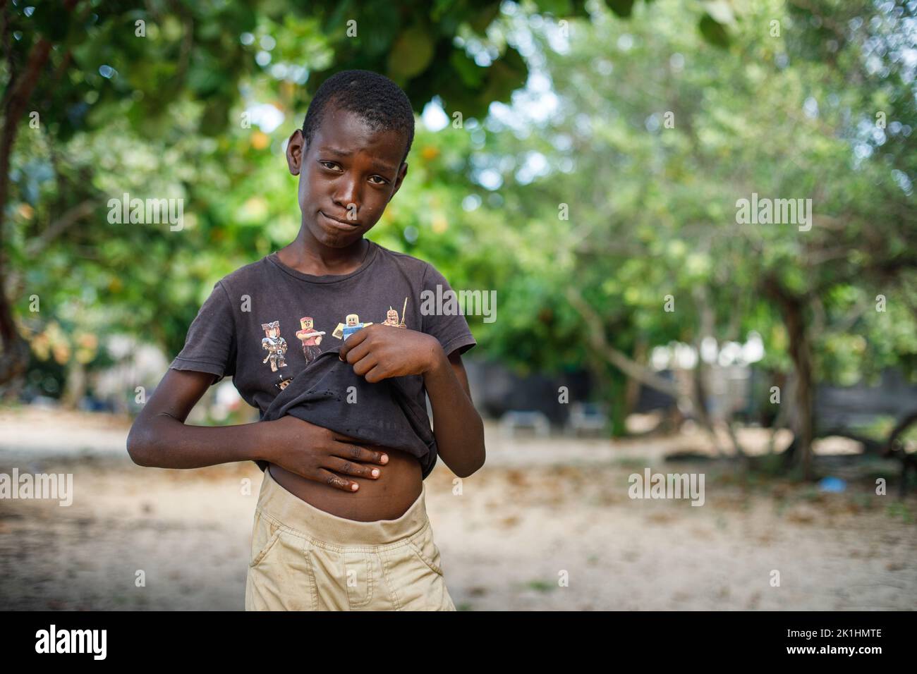12.09.2022 Dominican Republic Macao. Portrait of an hungry african boy. Slums. Stock Photo