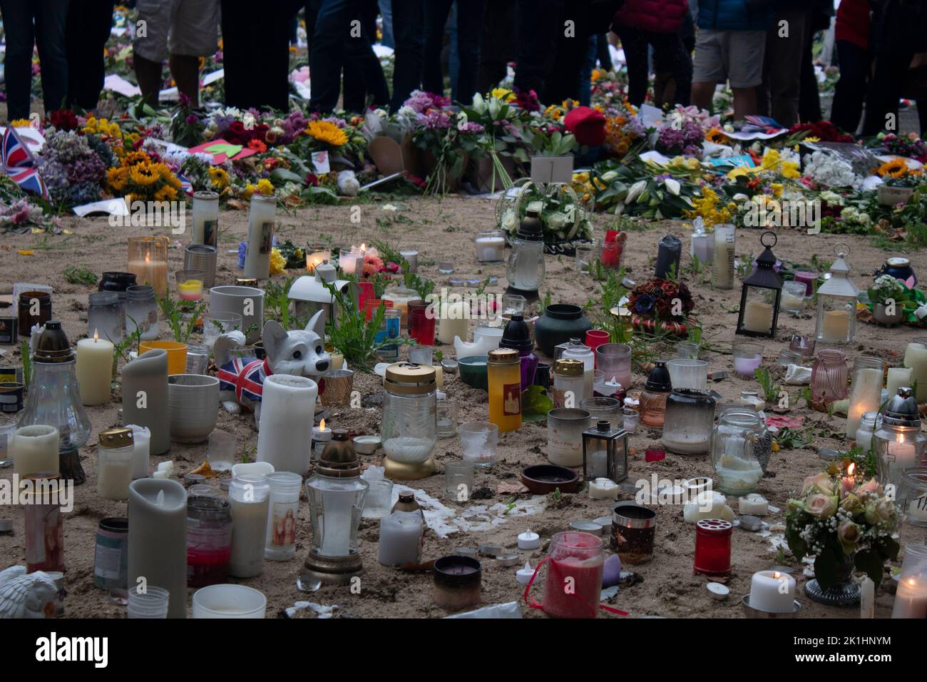 Candles, messages, cards and floral tributes in Green Park after the