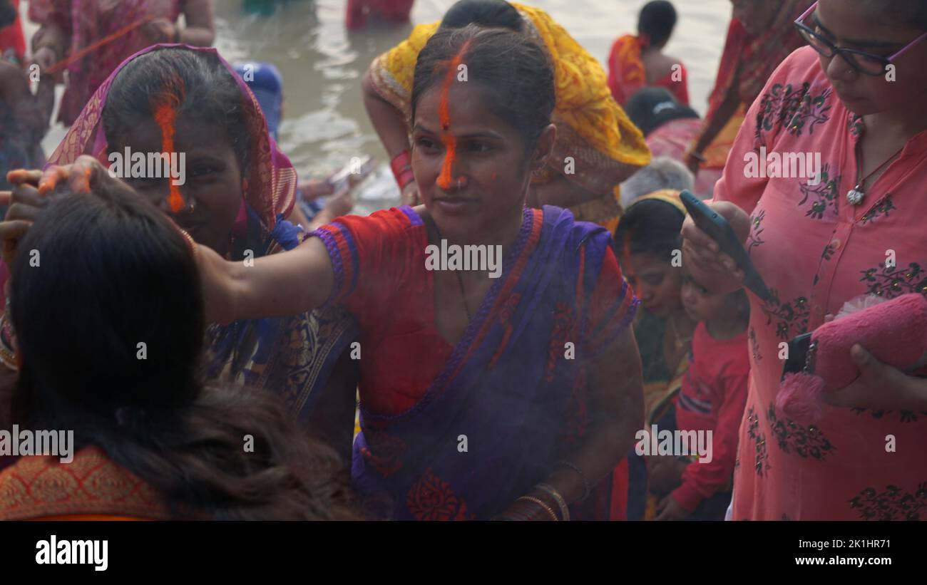 Kolkata, India. 18th Sep, 2022. Women taking a bath at the holy river Ganga and doing Puja after at the Ghat of Ganga. Women keeping fast for good health and longevity of their son. (Photo by Sunam Banerjee/Pacific Press) Credit: Pacific Press Media Production Corp./Alamy Live News Stock Photo