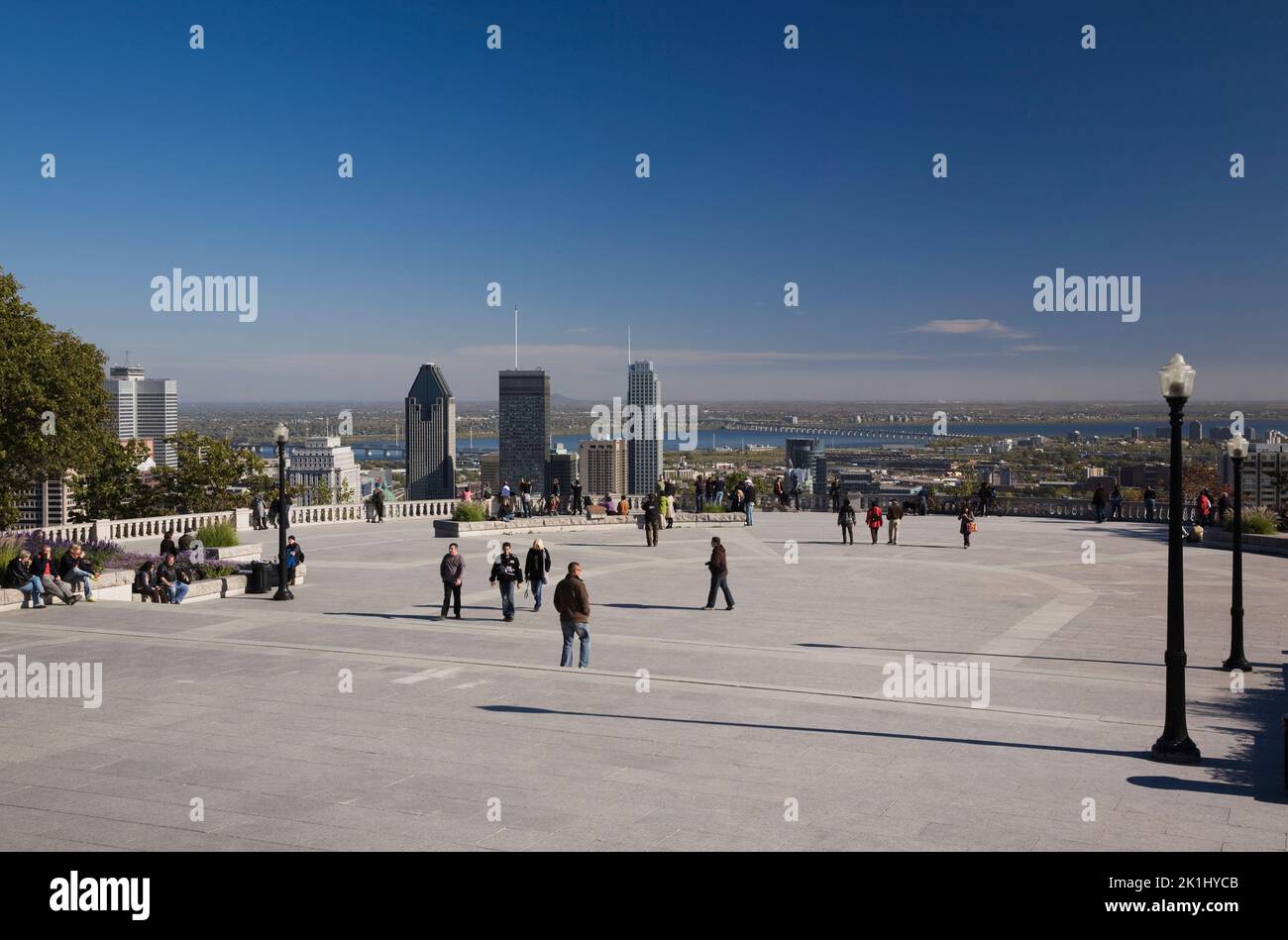 Tourists at lookout on Mount-Royal and Montreal skyline in autumn, Quebec, Canada. Stock Photo