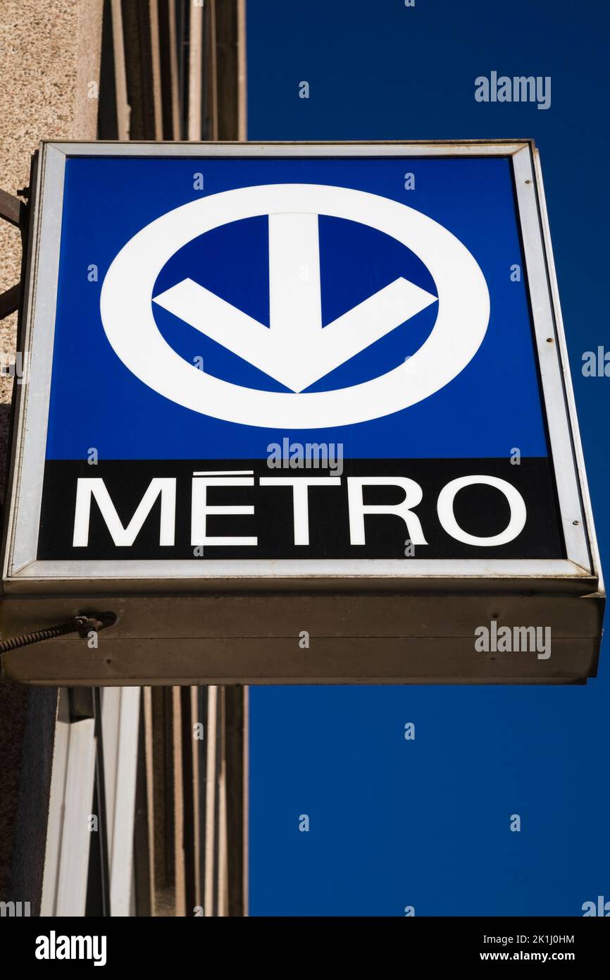 Montreal subway transportation system station sign attached to side of building in downtown Montreal, Quebec, Canada. Stock Photo