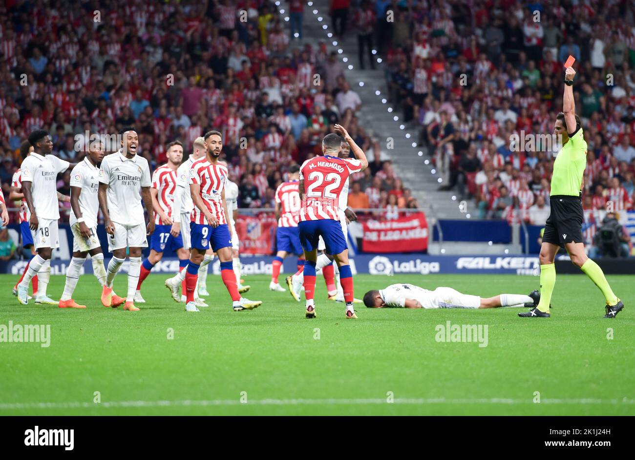 Madrid, Spain. 18th Sep, 2022. Mario Hermoso (3rd R) of Atletico de Madrid is given a red card during a La Liga Santander match between Atletico de Madrid and Rea Madrid in Madrid, Spain, Sept. 18, 2022. Credit: Gustavo Valiente/Xinhua/Alamy Live News Stock Photo