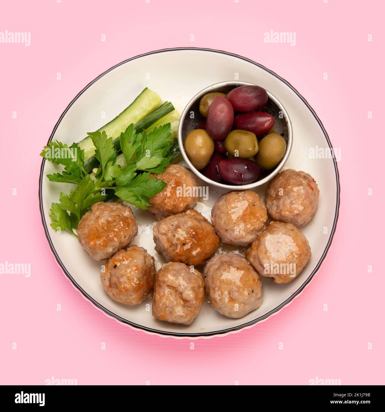 Greek meatballs keftedes on color background. Traditional food. Creative photo concept. Top view, copy space Stock Photo