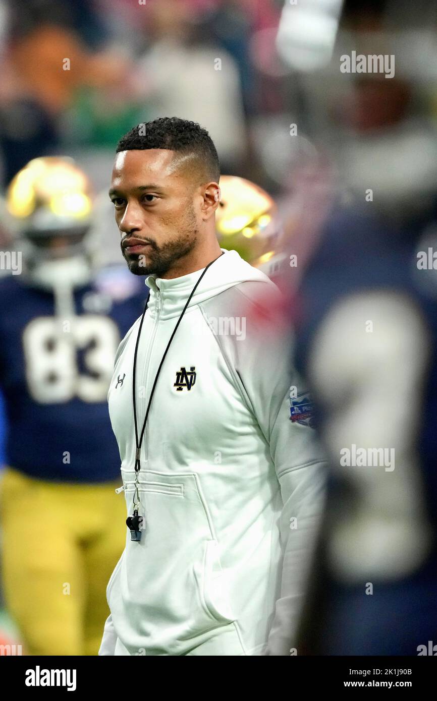 Norte Dame head coach Marcus Freeman coaches from the sidelines. Stock Photo