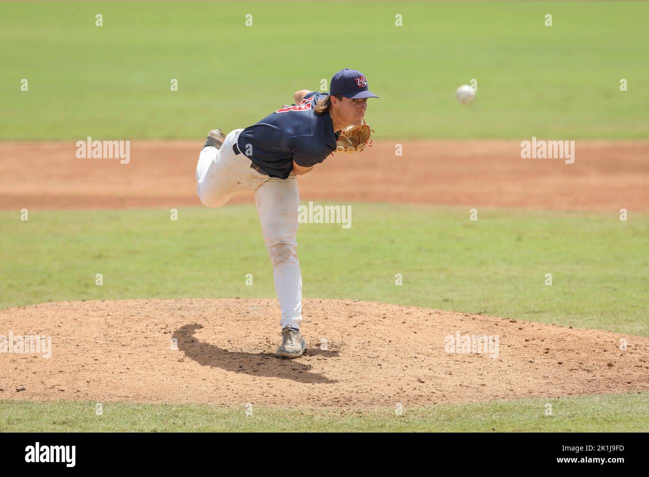 Sarasota, FL. USA;  Team USA pitcher Blake Mitchell (23) delivers a pitch in the bottom of the fourth inning during the Gold Medal Game against Chines Stock Photo
