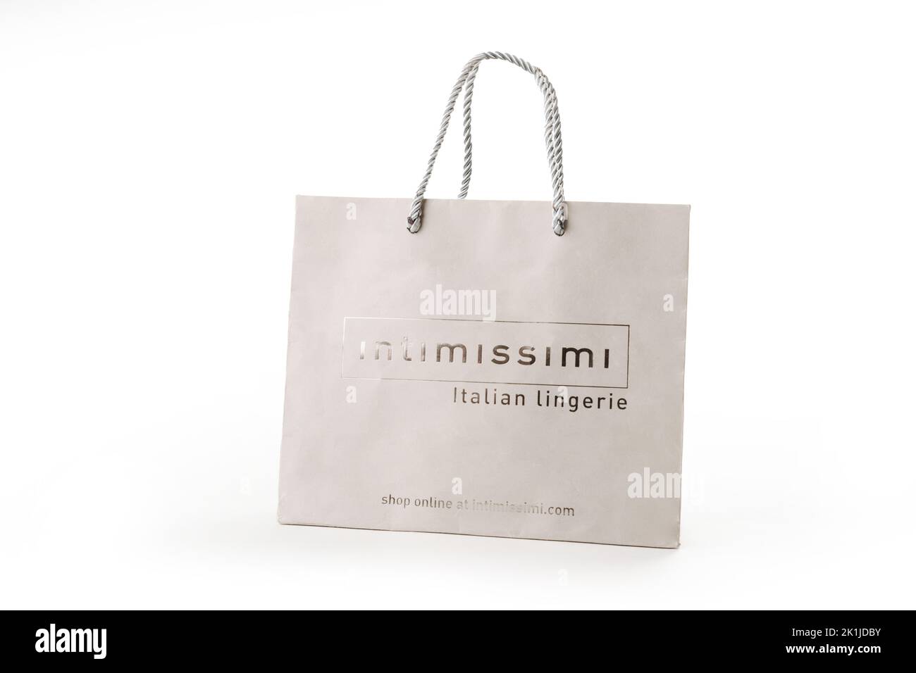 Cyprus, Paphos - SEPTEMBER 08, 2022: Branded paper bag of Intimissimi Italian men and women's underwear, lingerie and nightwear shop. Over white backg Stock Photo