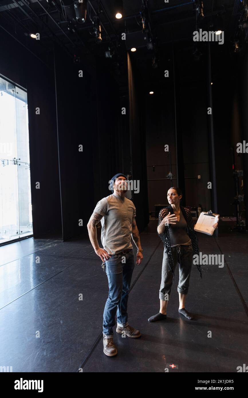 Stage manager and technician meeting on stage Stock Photo Alamy
