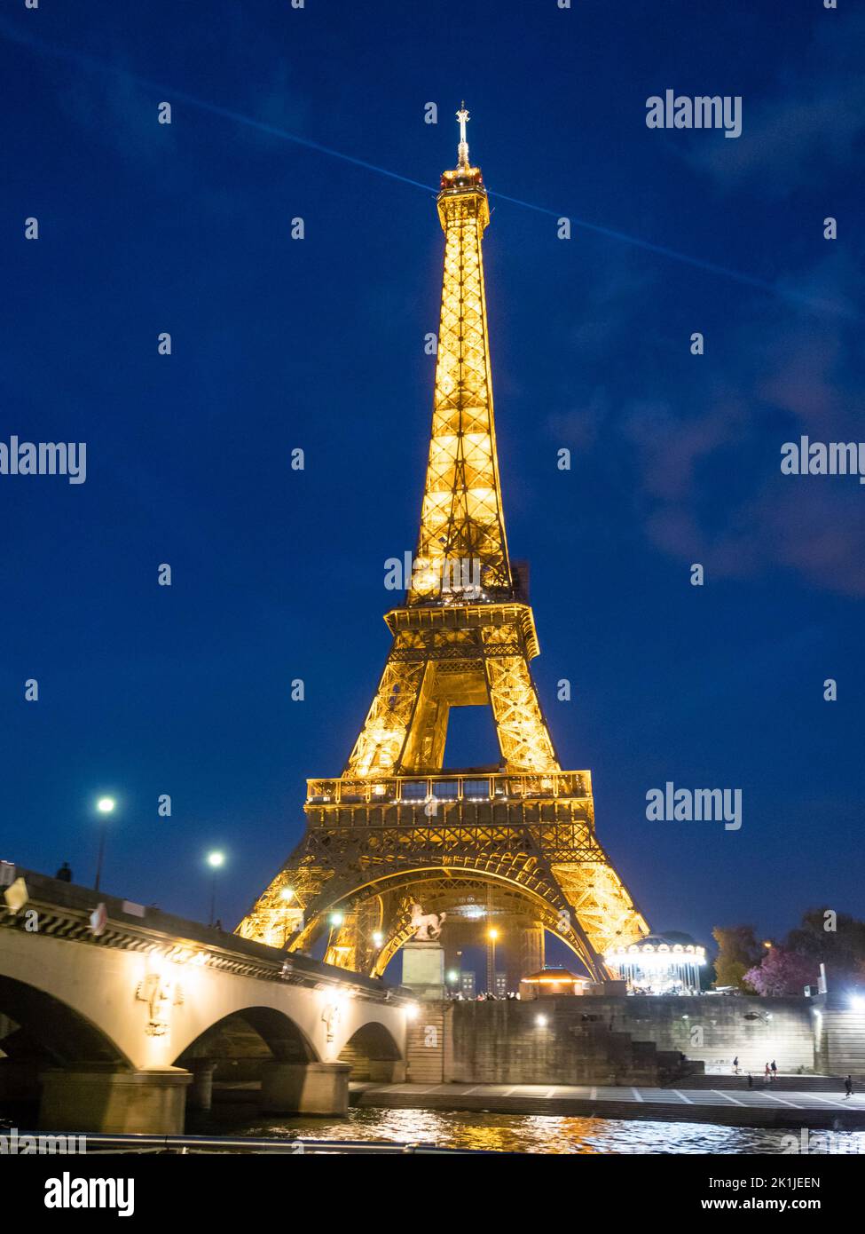 Paris, France - 19 April 2022: Illuminated Eiffel tower at night Stock Photo
