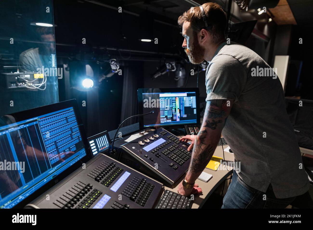 Male stage manager operating stage controls Stock Photo Alamy