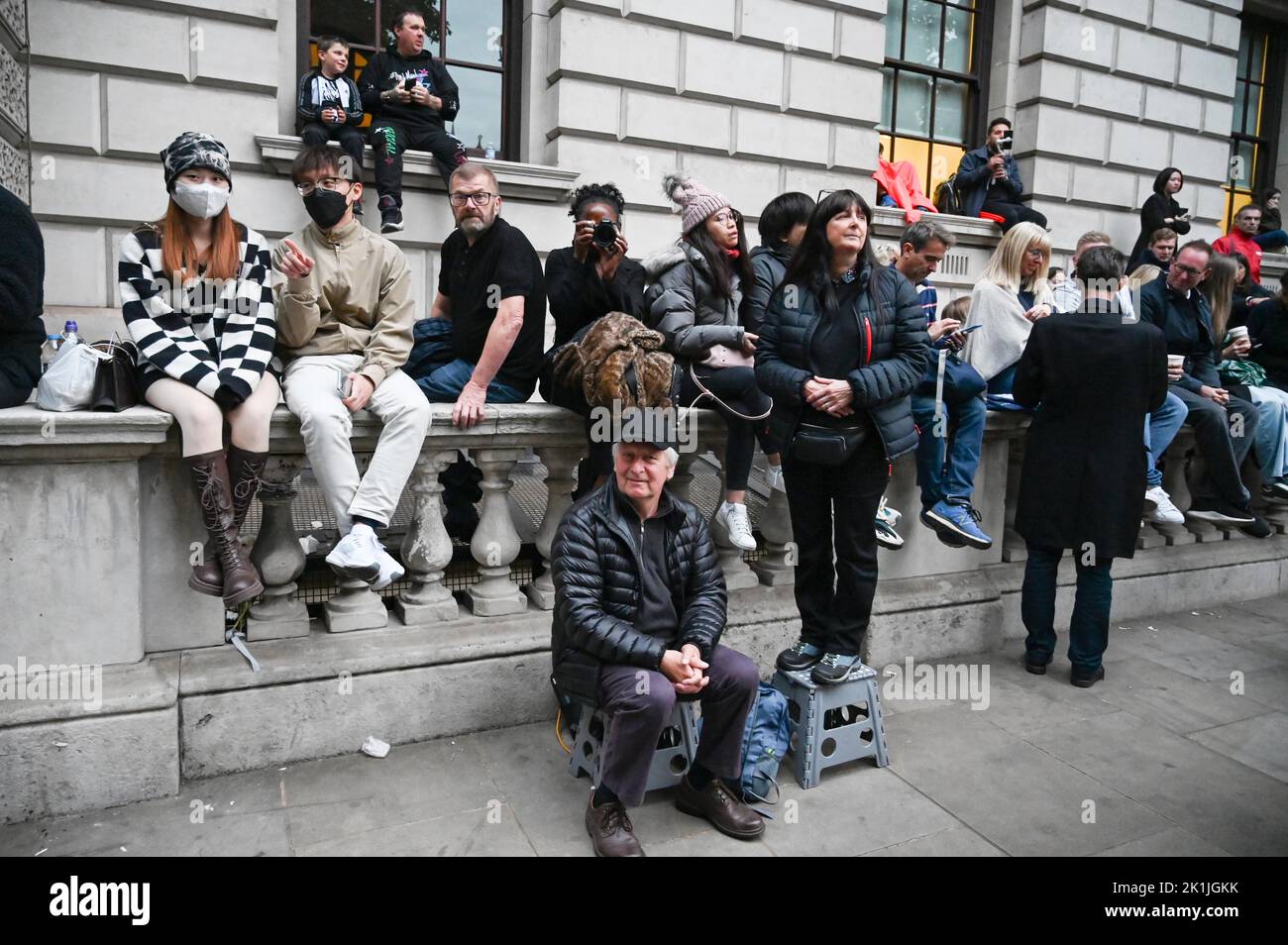 London UK 19th September 2022 - Crowds gather near Parliament Square in London to get a view of the funeral of Queen Elizabeth II : Credit Simon Dack / Alamy Live News Stock Photo