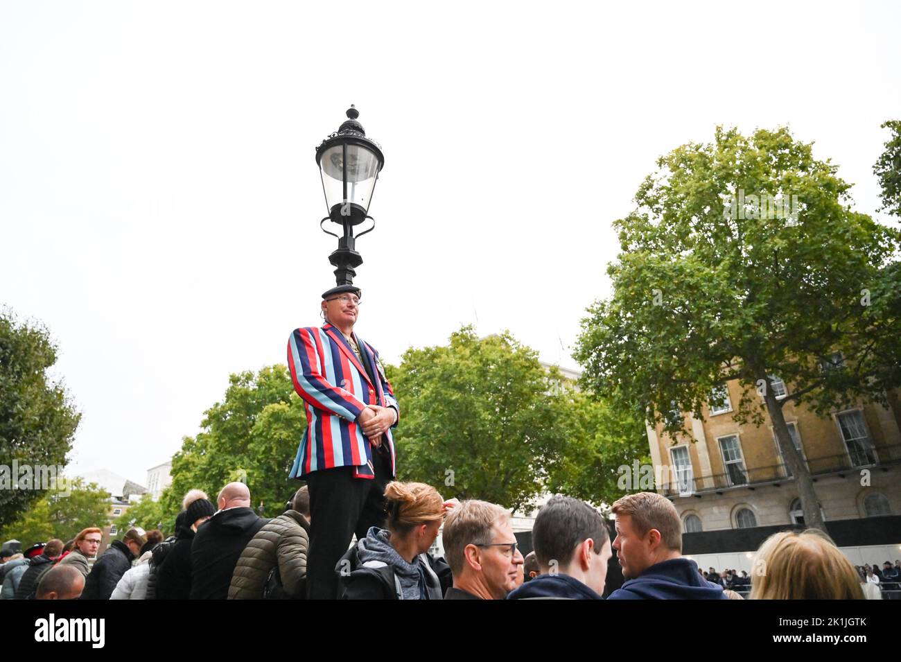 London UK 19th September 2022 - Crowds gather in Whitehall near Parliament Square in London to get a view of the funeral of Queen Elizabeth II : Credit Simon Dack / Alamy Live News Stock Photo