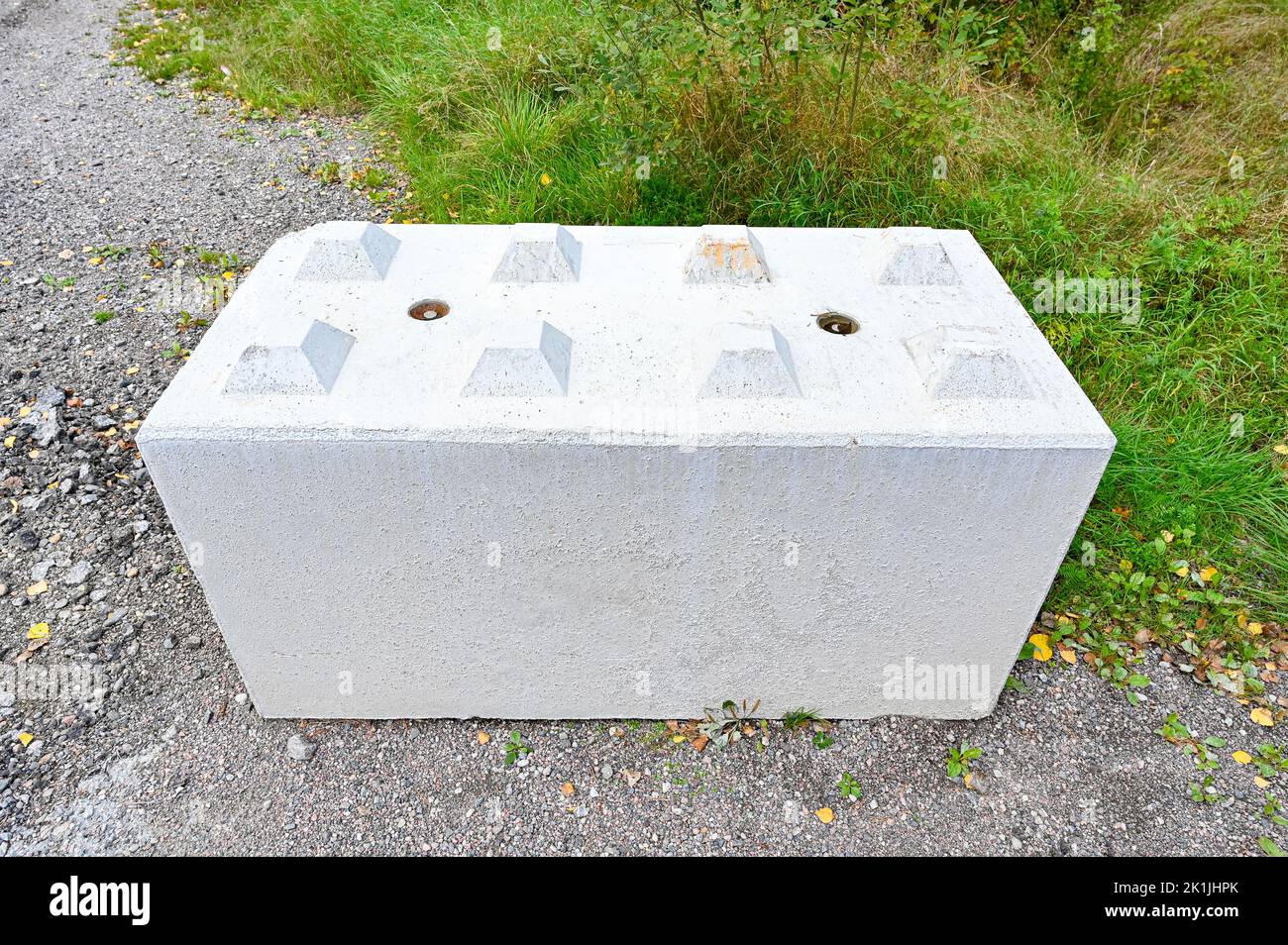 big concrete lego blocks to stop traffic Stock Photo Alamy