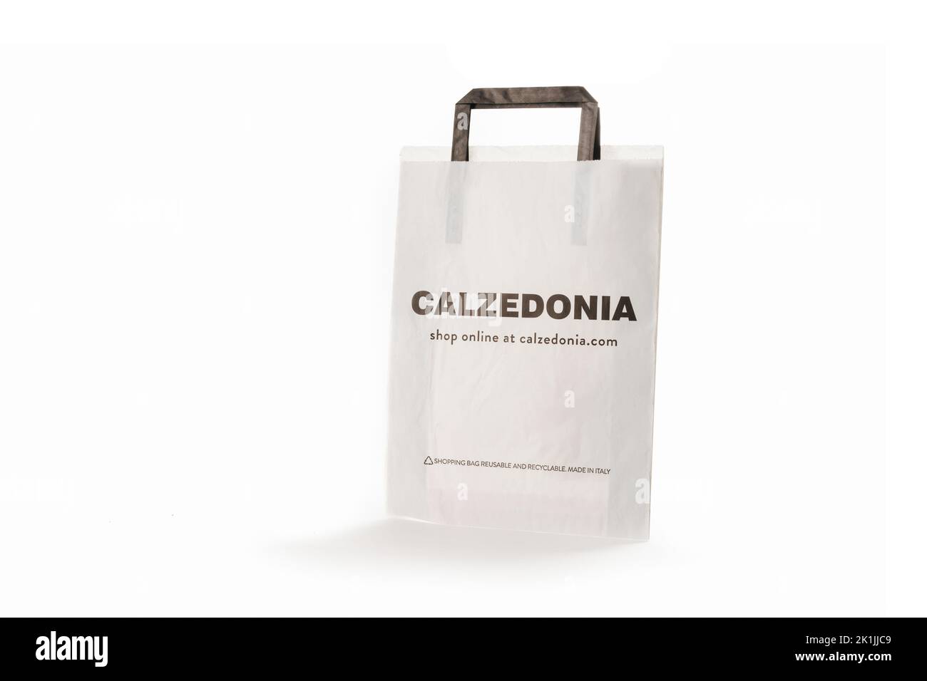 Cyprus, Paphos - SEPTEMBER 08, 2022: Branded paper bag of Calzedonia Italian specialised clothing shop selling bathing suits, tights, and leggings. Ov Stock Photo