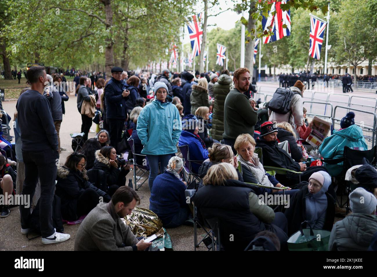 People gather on the day of the state funeral and burial of Britain's Queen Elizabeth, in London, Britain, September 19, 2022. REUTERS/Tom Nicholson Stock Photo