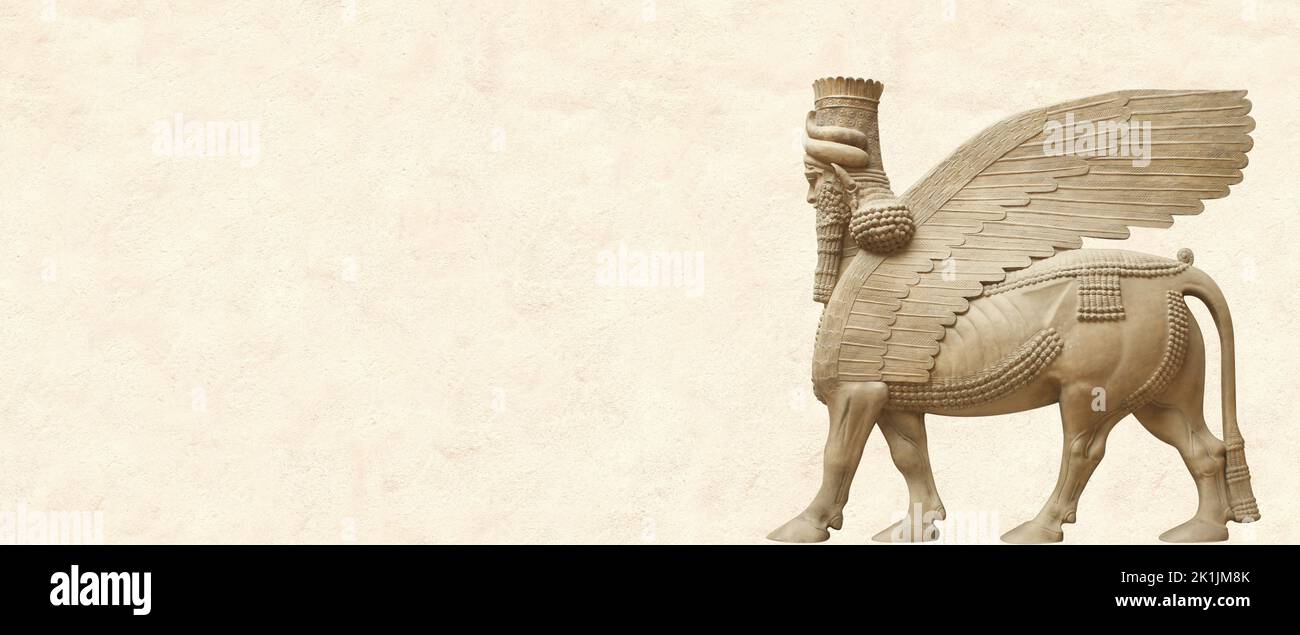 Grunge background with stone texture and lamassu - human-headed winged bull. Horizontal banner with assyrian protective deity. Copy space for text. Mo Stock Photo