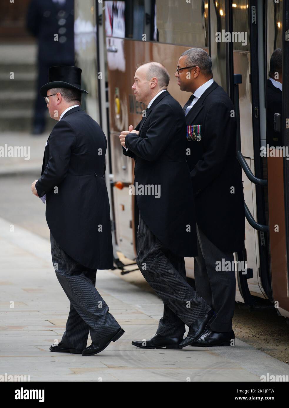 (left to right) Welsh Secretary Robert Buckland, Secretary of State for Northern Ireland Chris Heaton-Harris and Foreign Secretary James Cleverly arriving at the State Funeral of Queen Elizabeth II, held at Westminster Abbey, London. Picture date: Monday September 19, 2022. Stock Photo