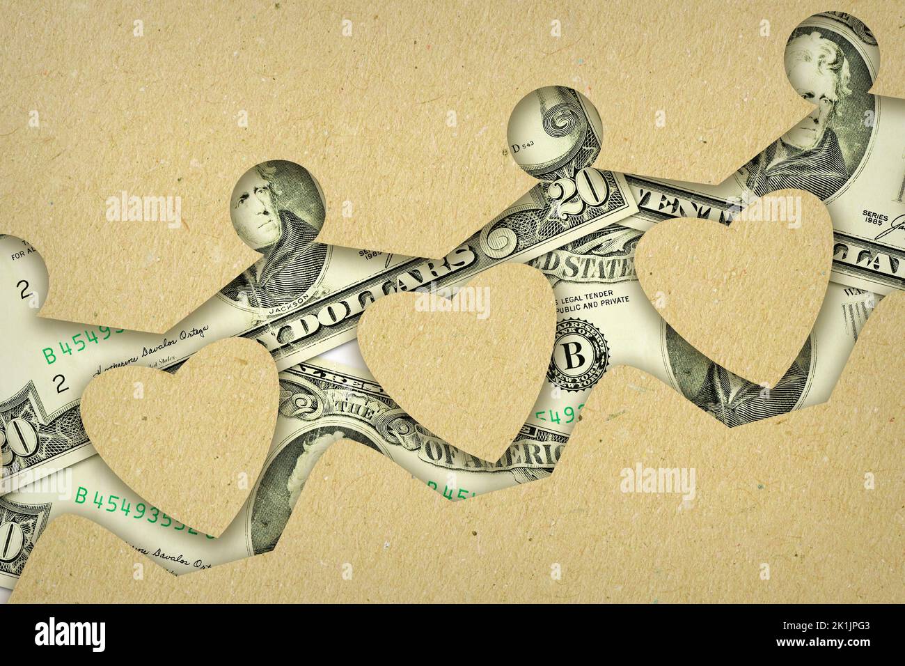 Paper people chain made with dollar banknotes- Concept of economic and financial assistance Stock Photo