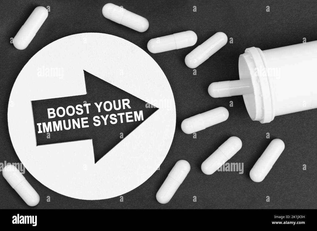 Medicine concept. Pills on a black background. They are indicated by a