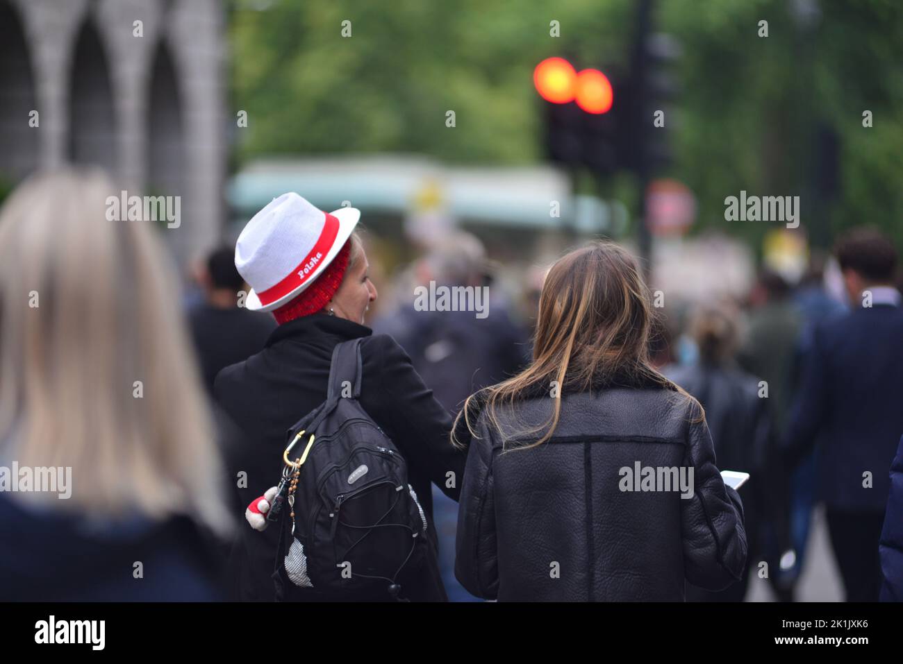State funeral of Her Majesty Queen Elizabeth II, London, UK, Monday 19th September 2022. Woman wearing Polish Polska hat among the mourners heading to the event. Stock Photo